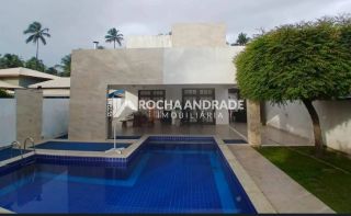 Casa 4 suítes no condômino Arauá