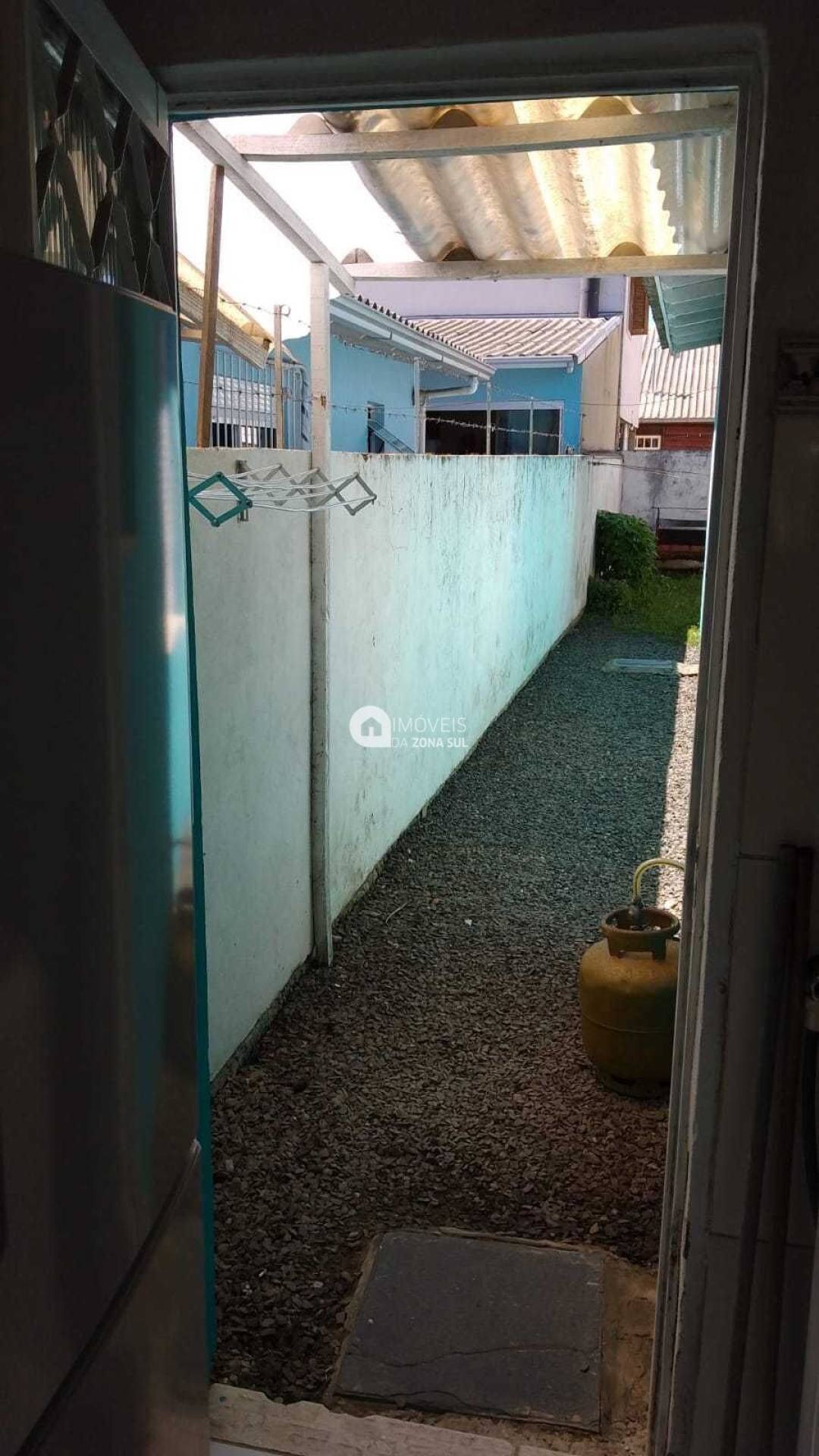 Casa para Vender com 2 vagas de garagem com 3 quartos 2 banheiros 1 suíte no bairro Belém Novo em Porto Alegre/RS