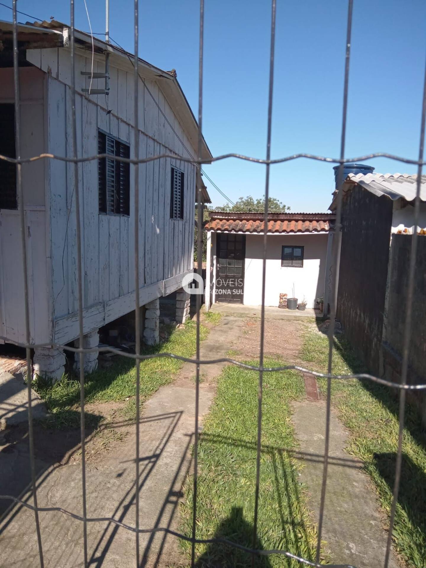 Casa para Vender com 2 vagas de garagem com 2 quartos 1 banheiro no bairro Campo Novo em Porto Alegre/RS