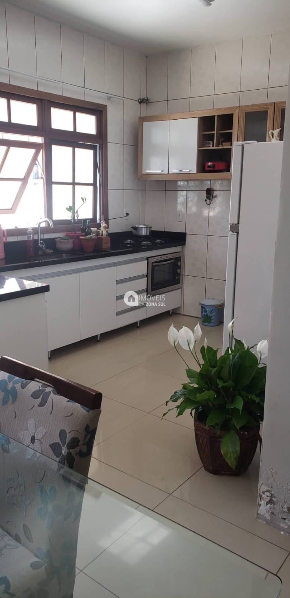 Casa para Vender com 1 vaga de garagem com 2 quartos 3 banheiros 2 suítes no bairro Vila Nova em Porto Alegre/RS