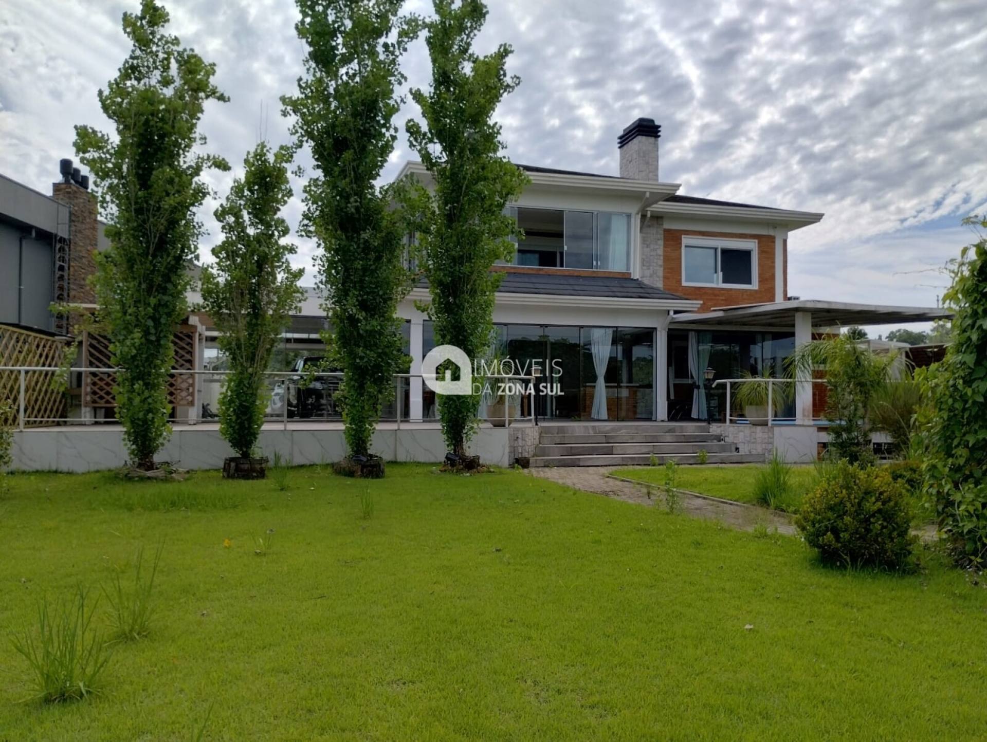 Casa para Vender com 4 quartos 5 banheiros 4 suítes no bairro Belém Novo em Porto Alegre/RS