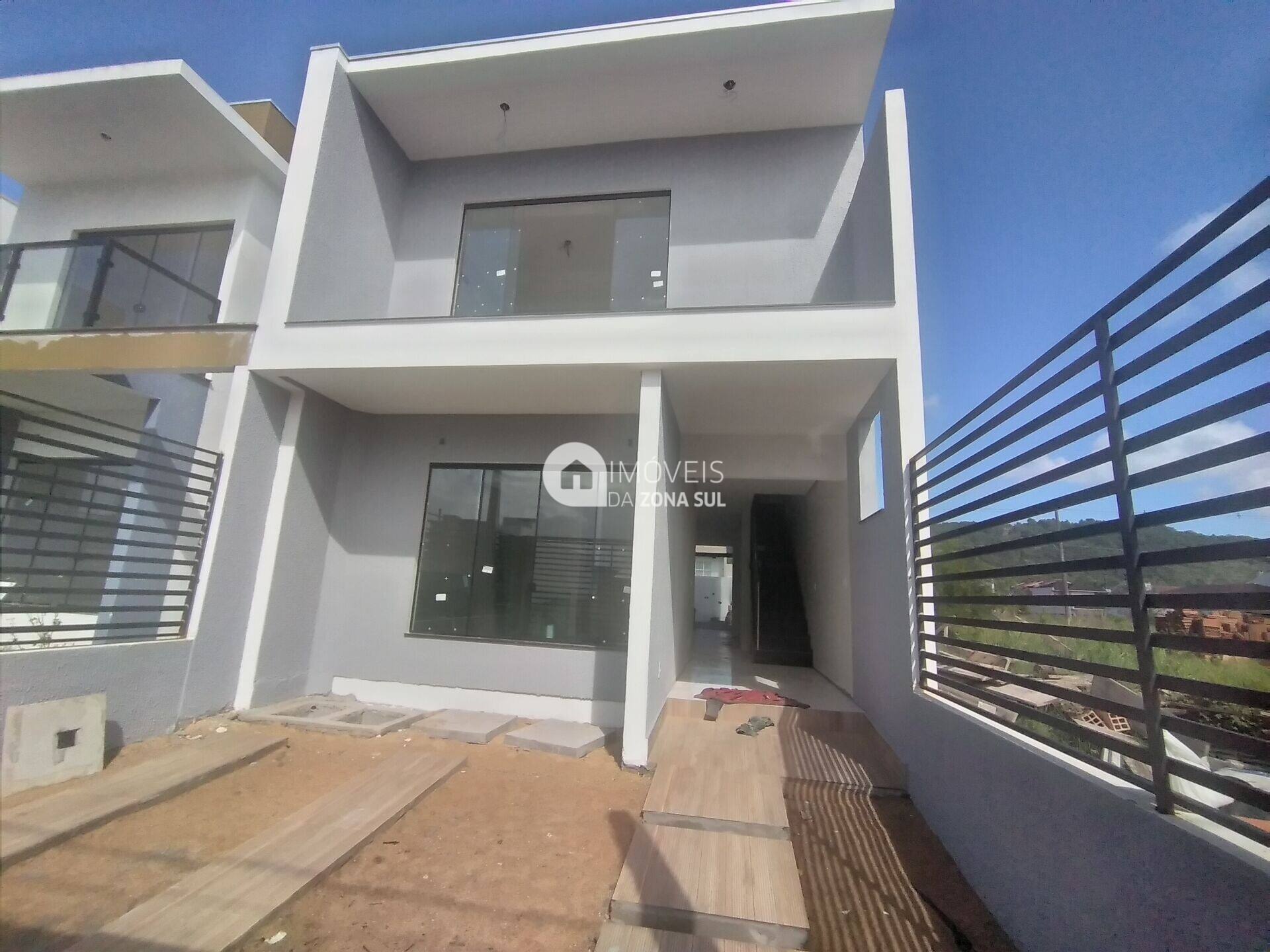Casa para Vender com 2 vagas de garagem com 3 quartos 4 banheiros 3 suítes no bairro Aberta dos Morros em Porto Alegre/RS