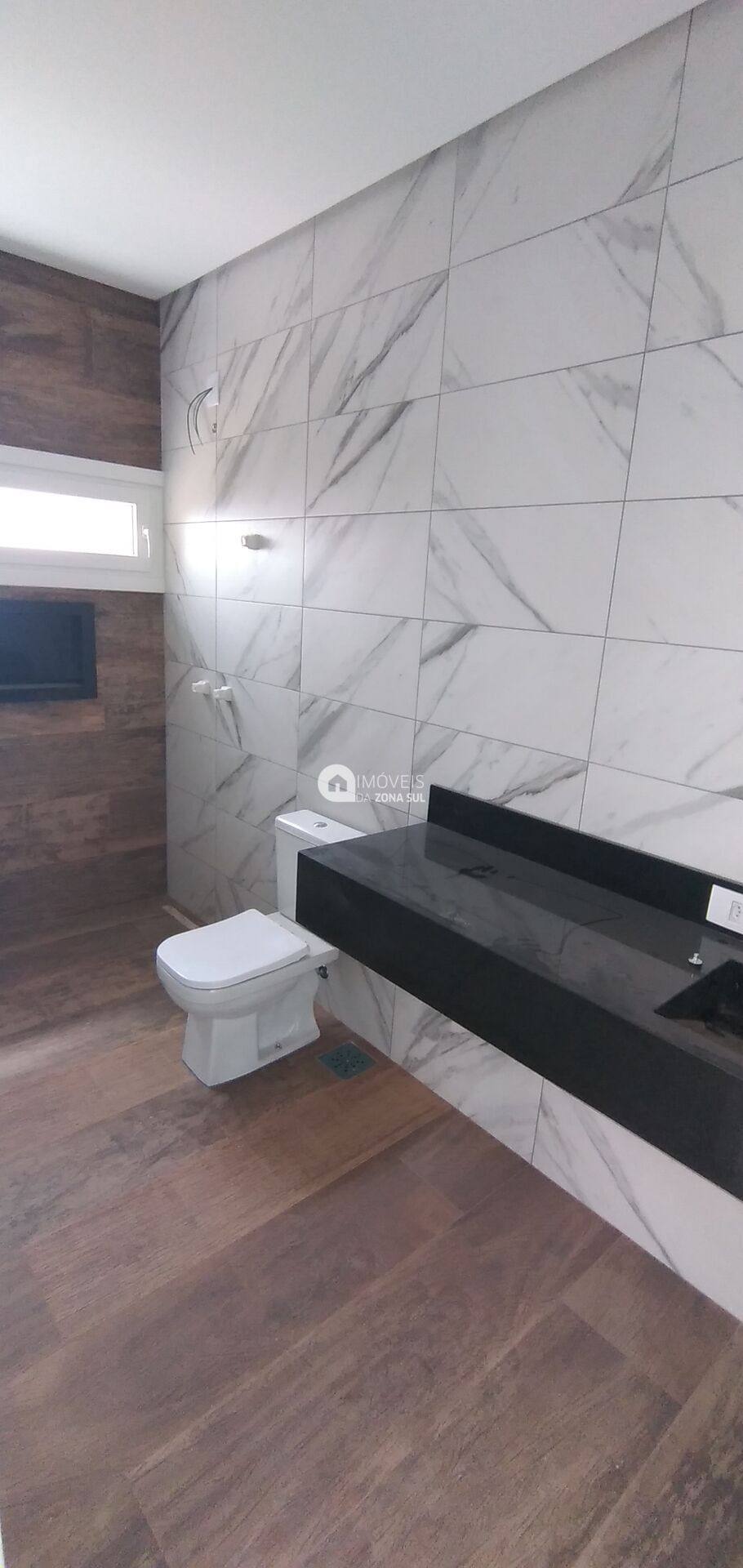Casa para Vender com 2 vagas de garagem com 3 quartos 3 banheiros 3 suítes no bairro Aberta dos Morros em Porto Alegre/RS