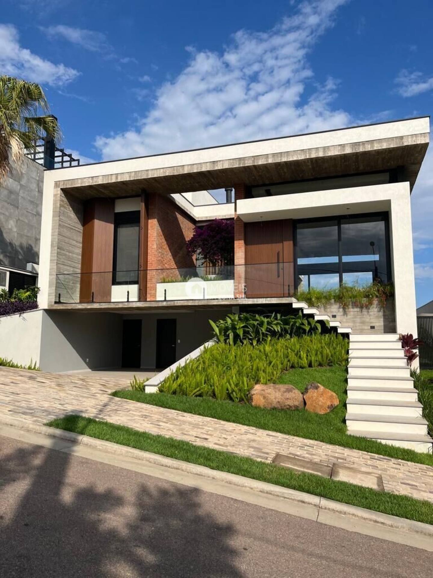Casa para Vender com 4 vagas de garagem com 4 quartos 5 banheiros 4 suítes no bairro Vila Nova em Porto Alegre/RS