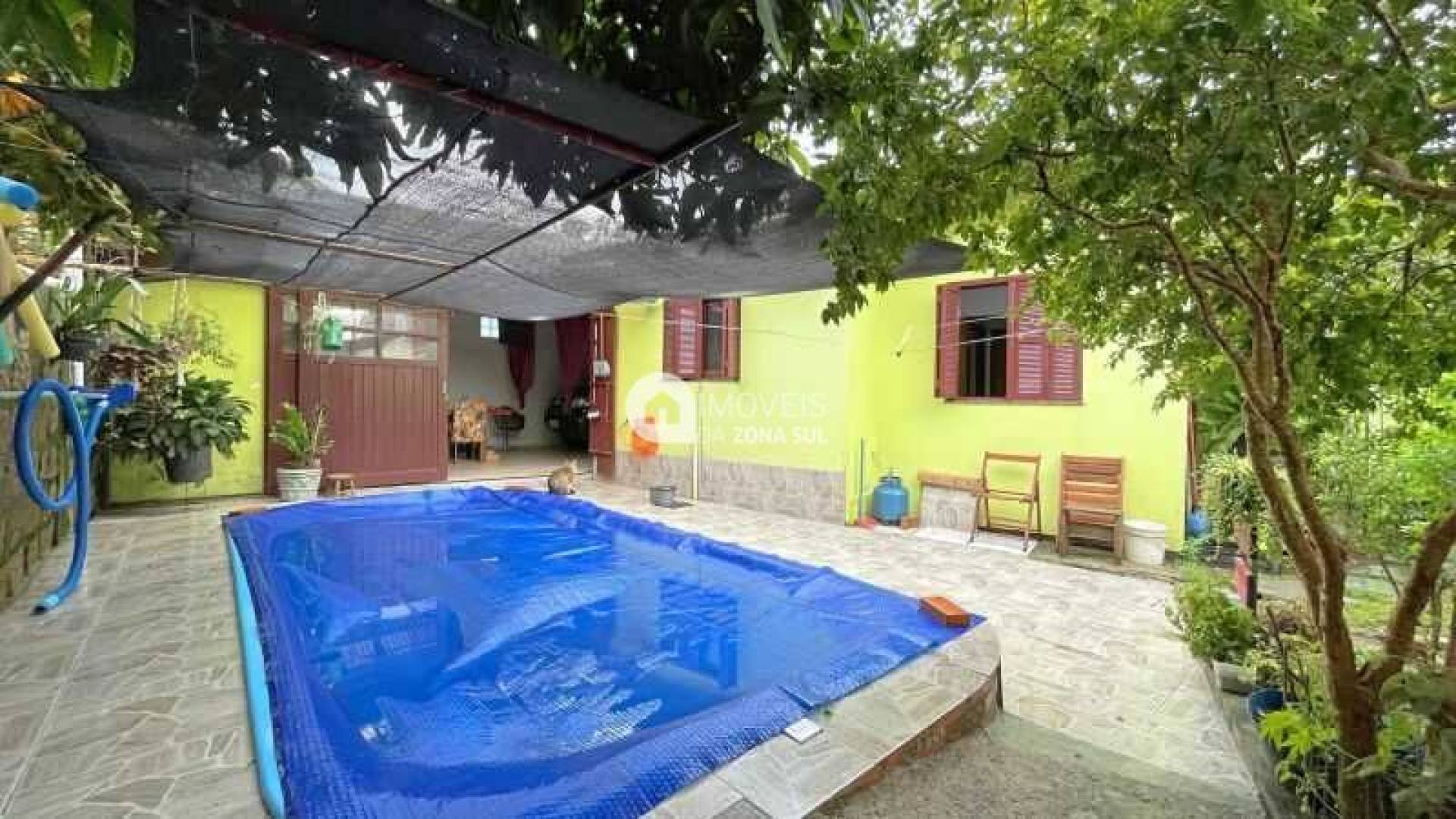 Casa para Vender com 4 vagas de garagem com 2 quartos 1 banheiro 1 suíte no bairro Campo Novo em Porto Alegre/RS