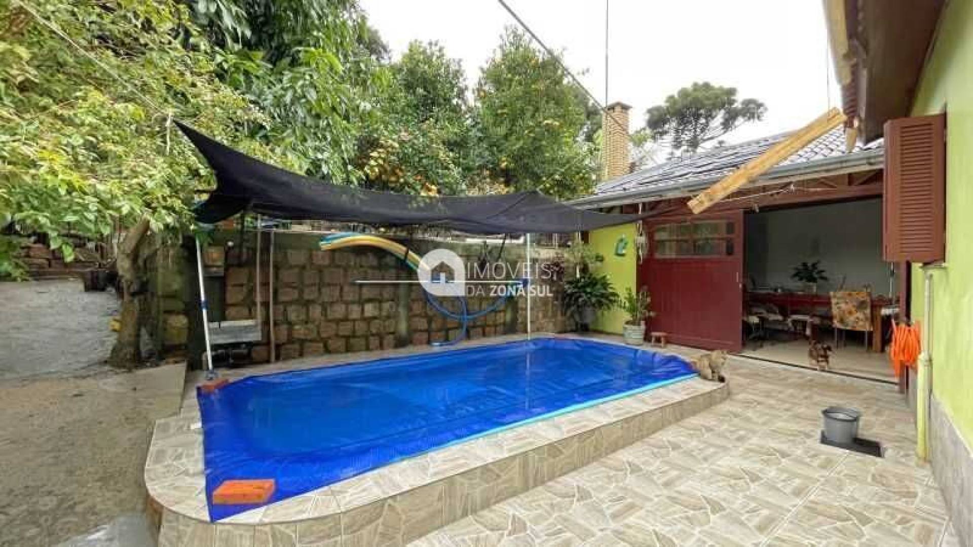 Casa para Vender com 4 vagas de garagem com 2 quartos 1 banheiro 1 suíte no bairro Campo Novo em Porto Alegre/RS