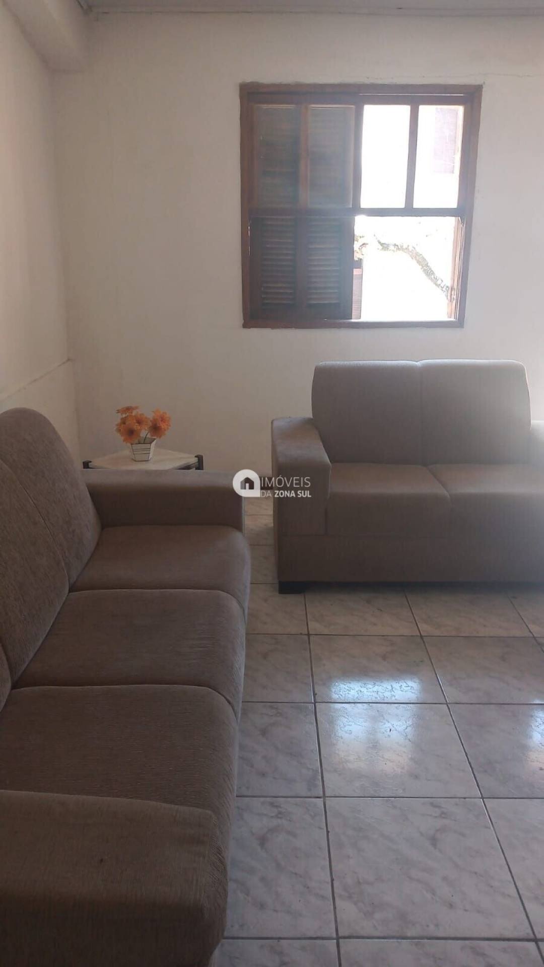 Casa para Vender com 2 vagas de garagem com 3 quartos 3 banheiros 1 suíte no bairro Vila Nova em Porto Alegre/RS