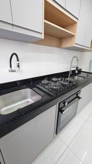 Apto com cozinha planejada e suíte