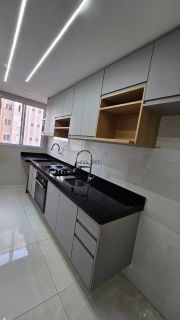 Apto com cozinha planejada e suíte