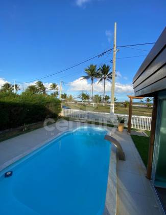 Casa 3/4 PORTAL DAS ÁGUAS: Seu Paraíso EXCLUSIVO FRENTE MAR com VISTA LIVRE ETERNA!