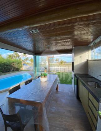 Casa 3/4 PORTAL DAS ÁGUAS: Seu Paraíso EXCLUSIVO FRENTE MAR com VISTA LIVRE ETERNA!