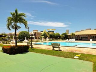 Lote em frente ao lago no Condomínio Melício Machado, Aruana (15x30 m²).