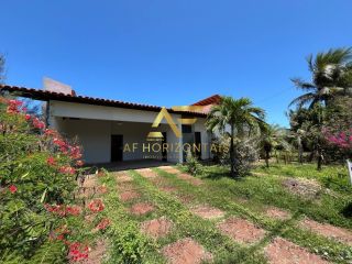 Casa espaçosa, com ampla área externa (2 lotes), no Condomínio Praias do Sul 1.