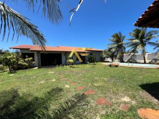 Casa espaçosa, com ampla área externa (2 lotes), no Condomínio Praias do Sul 1.