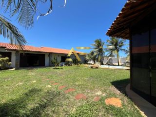 Casa espaçosa, com ampla área externa (2 lotes), no Condomínio Praias do Sul 1.