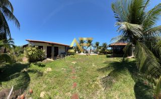 Casa espaçosa, com ampla área externa (2 lotes), no Condomínio Praias do Sul 1.
