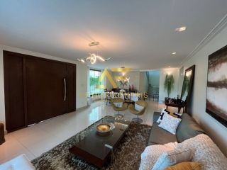 Linda casa em condomínio, em frente ao lago, com 4 suítes e piscina privativa.