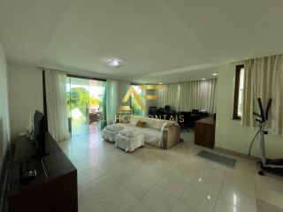 Linda casa em condomínio, em frente ao lago, com 4 suítes e piscina privativa.