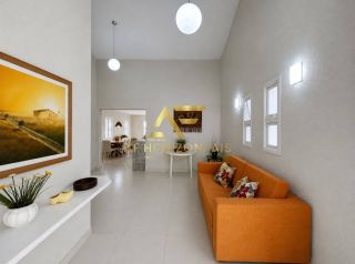 Casa em frente à praia, com 3 quartos, sendo 1 suíte.