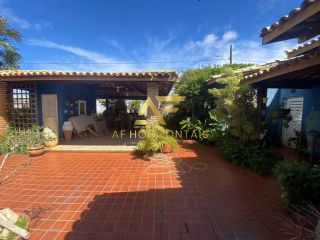 Casa com piscina no Condomínio Melício Machado (2 lotes), Aruana, com 3 suítes.