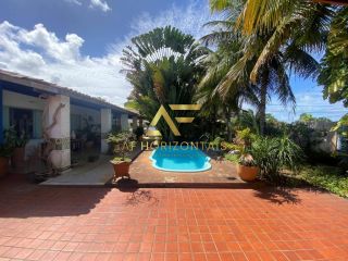 Casa com piscina no Condomínio Melício Machado (2 lotes), Aruana, com 3 suítes.