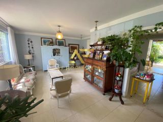 Casa com piscina no Condomínio Melício Machado (2 lotes), Aruana, com 3 suítes.