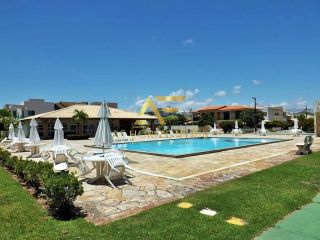 Casa com piscina no Condomínio Melício Machado (2 lotes), Aruana, com 3 suítes.