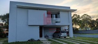 CASA EM ALDEIA COM 5 SUÍTES EM CONDOMÍNIO