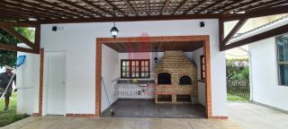 Casa em Condomínio na Beira da Pista 400m 4 Quartos Espaço Gourmet e Piscina