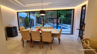 CASA TÉRREA EM CONDOMÍNIO 4 SUÍTES 190M² ESPAÇO GOURMET E PISCINA