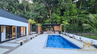 CASA TÉRREA EM CONDOMÍNIO 4 SUÍTES 190M² ESPAÇO GOURMET E PISCINA