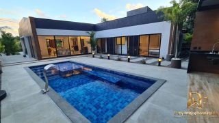 CASA TÉRREA EM CONDOMÍNIO 4 SUÍTES 190M² ESPAÇO GOURMET E PISCINA