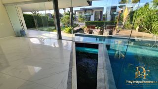 Casa em Condomínio 4 Suítes Piscina e Mini Lago