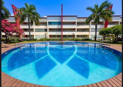 APARTAMENTO DE PRAIA NO VERSILIA BEACH - POR R$ 510.000,00