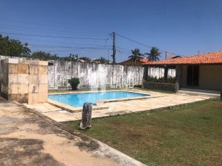 CASA PLANA NO PORTO DAS DUNAS COM 4 QUARTOS (2 SUÍTES), PISCINA, DECK COM CHURRASQUEIRA, 4 LOTES CONJUGADOS, A POUCOS METROS DO GOLF VILLE, DOCUMENTAÇÃO 100% REGULARIZADA - 300 M² - ÁREA TOTAL DO TERRENO  1.980 M² - R$ 1.150.000 - AQUIRAZ/CE
