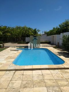 CASA PLANA NO PORTO DAS DUNAS COM 4 QUARTOS (2 SUÍTES), PISCINA, DECK COM CHURRASQUEIRA, 4 LOTES CONJUGADOS, A POUCOS METROS DO GOLF VILLE, DOCUMENTAÇÃO 100% REGULARIZADA - 300 M² - ÁREA TOTAL DO TERRENO  1.980 M² - R$ 1.150.000 - AQUIRAZ/CE