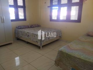 CASA PLANA NO PORTO DAS DUNAS COM 4 QUARTOS (2 SUÍTES), PISCINA, DECK COM CHURRASQUEIRA, 4 LOTES CONJUGADOS, A POUCOS METROS DO GOLF VILLE, DOCUMENTAÇÃO 100% REGULARIZADA - 300 M² - ÁREA TOTAL DO TERRENO  1.980 M² - R$ 1.150.000 - AQUIRAZ/CE