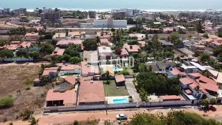 CASA PLANA NO PORTO DAS DUNAS COM 4 QUARTOS (2 SUÍTES), PISCINA, DECK COM CHURRASQUEIRA, 4 LOTES CONJUGADOS, A POUCOS METROS DO GOLF VILLE, DOCUMENTAÇÃO 100% REGULARIZADA - 300 M² - ÁREA TOTAL DO TERRENO  1.980 M² - R$ 1.150.000 - AQUIRAZ/CE