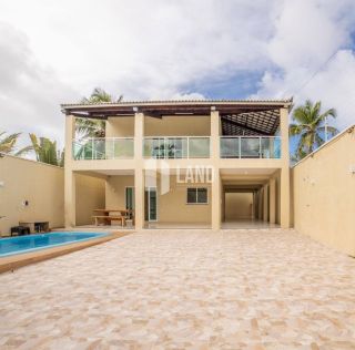 Casa Duplex para vender na praia de Paracuru/CE com 5 quartos (4 suítes), 2 banheiros sociais, piscina, deck com churrasqueira, 4 vagas - 415m² (casa) - 600m² (terreno) - R$ 399.000  - Paracuru/CE