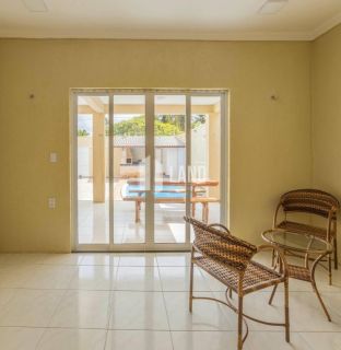 Casa Duplex para vender na praia de Paracuru/CE com 5 quartos (4 suítes), 2 banheiros sociais, piscina, deck com churrasqueira, 4 vagas - 415m² (casa) - 600m² (terreno) - R$ 399.000  - Paracuru/CE