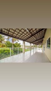 Casa Duplex para vender na praia de Paracuru/CE com 5 quartos (4 suítes), 2 banheiros sociais, piscina, deck com churrasqueira, 4 vagas - 415m² (casa) - 600m² (terreno) - R$ 399.000  - Paracuru/CE