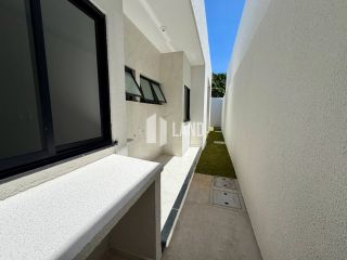 LINDA CASA EM RUA PRIVATIVA NO EDSON QUEIROZ, COM 3 SUÍTES E 2 VAGAS DE GARAGEM.