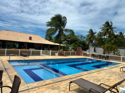 CASA DE ALTO PADRÃO À VENDA NO CONDOMÍNIO COSTA MARINA | 4 SUÍTES | ESQUINA | LAZER PRIVATIVO
