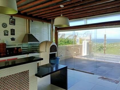 Casa Para Vender com 05 quartos 05 suítes no bairro ITAPUÃ em Salvador