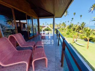 Casa 4 suítes á venda frente mar no Condomínio Piscinas Naturais em Praia do Forte