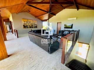 Casa 4 suítes á venda frente mar no Condomínio Piscinas Naturais em Praia do Forte