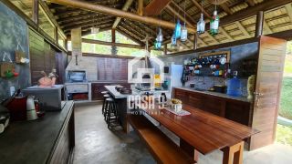 Casa alto padrão na beira da Lagoa Aruá em Praia do Forte Bahia