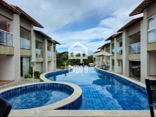 Apartamento a venda com 2 suítes à 650 metros da praia em Imbassai Bahia