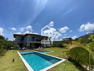 Casa alto padrão mobiliada a venda com 5 suítes no Condomínio Praia Bella em Praia do Forte Bahia