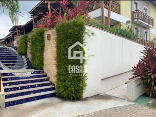 Apartamento térreo 3 suítes pé na areia a venda no condomínio Lua Nova em Itacimirim Bahia